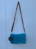 Handmade knitted crossbody handbag