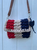 Handmade knitted crossbody handbag