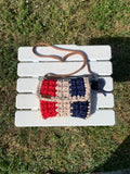 Handmade knitted crossbody handbag